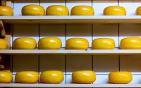 round cheese on shelves